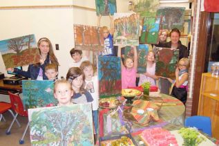 Students in the Land O' lakes Art Club show off their landscape paintings at a special art show/vernissage that took place at Land O' Lakes Public School in Mountain Grove on November 19.
